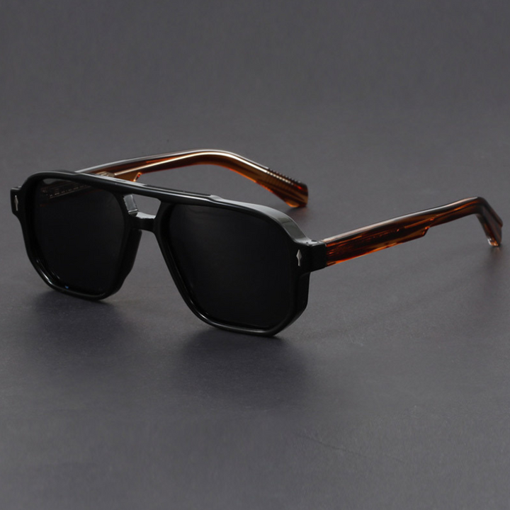 Unisex aviator sunglasses against a bright background, highlighting their durability & sleek design
