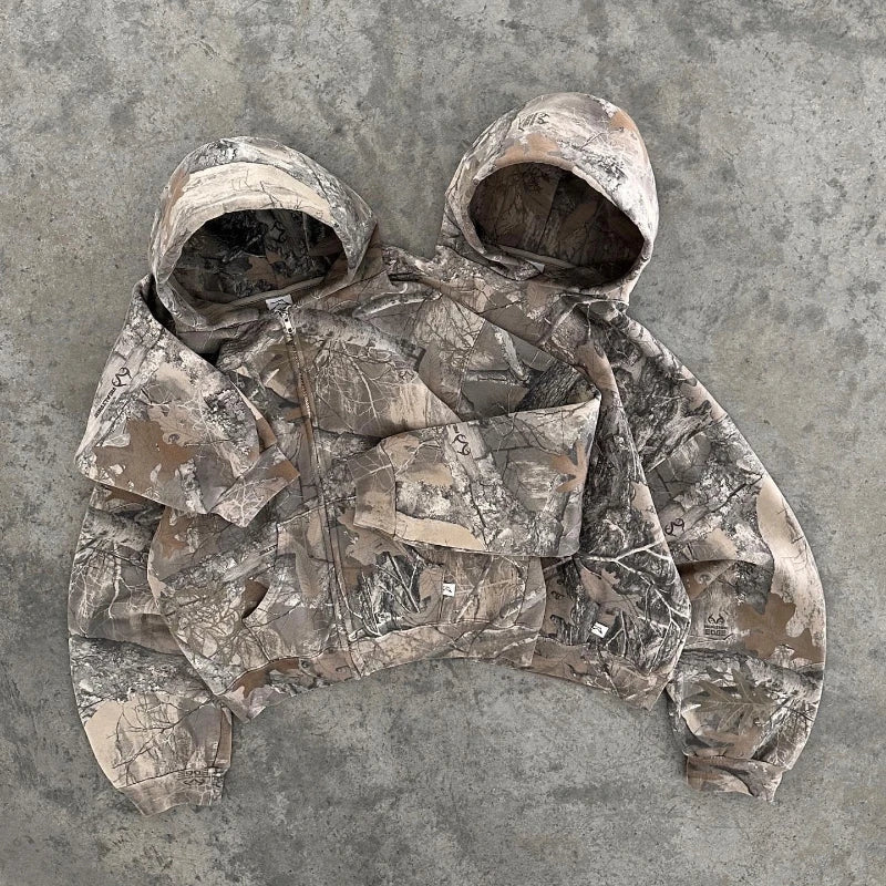"Unisex camo streetwear hoodie with tactical print, front view. Urban and outdoor style, men's jackets and coats collection."