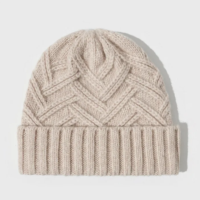 Detailed view of the chevron pattern on a comfortable unisex knit beanie, perfect for winter fashion