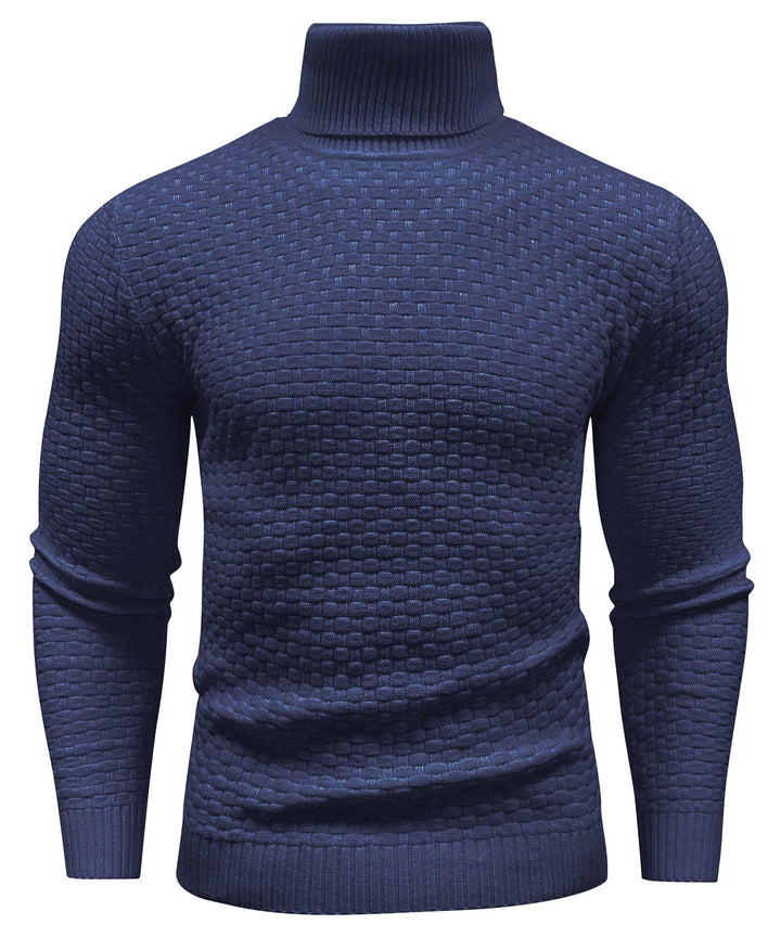 Side view of a unisex cozy turtleneck sweater in a charcoal grey, showcasing its long sleeve style.