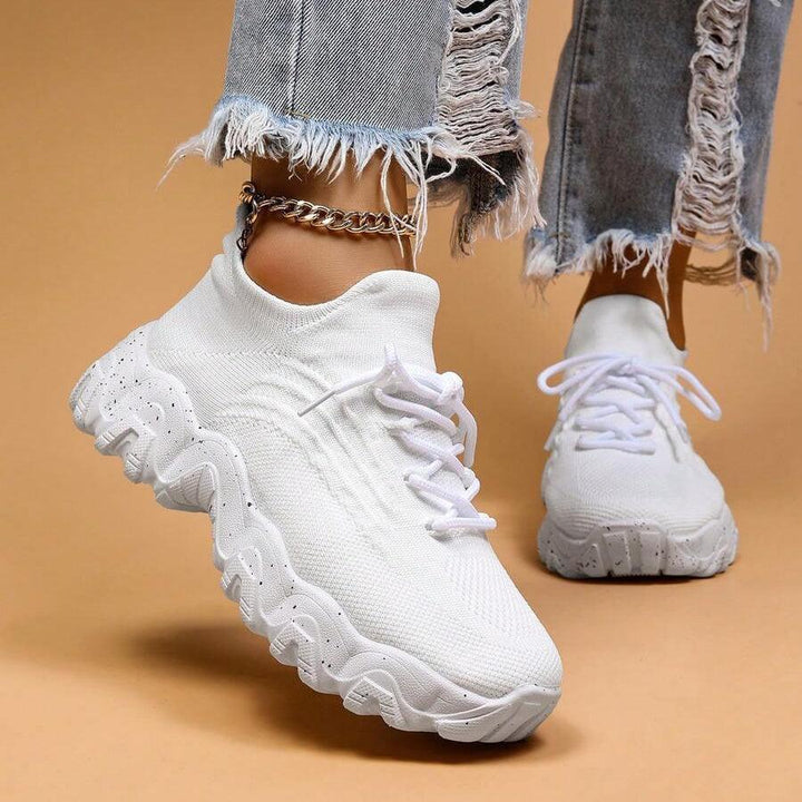 The non-slip sole of Unisex Everyday Comfort Low-Top Sneakers, providing stability and safety for walking