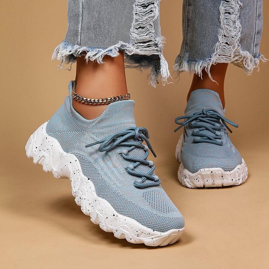 Dynamic shot of Unisex Everyday Comfort Low-Top Sneakers, showing flexibility for everyday activities