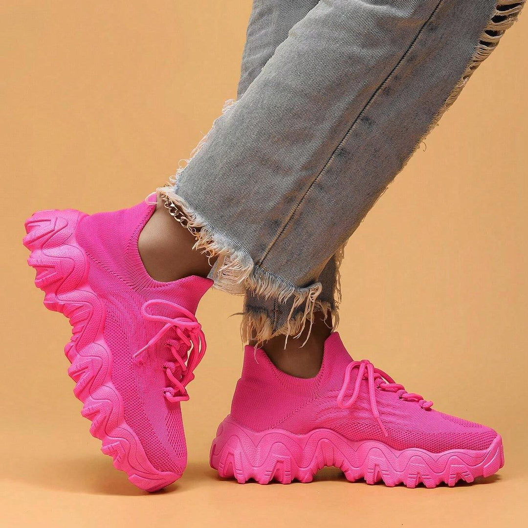 Unisex Everyday Comfort Low-Top Sneakers on a textured surface, showing the grip of the non-slip sole