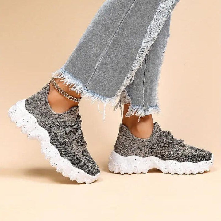 Unisex Everyday Comfort Low-Top Sneakers on a run, demonstrating their performance for athletic casual activities