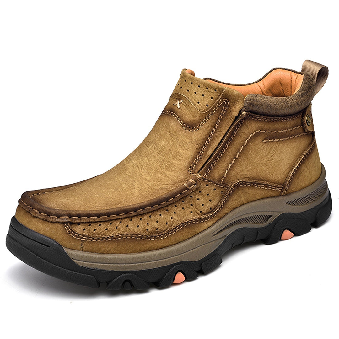 Close-up of black leather high-top orthopedic shoes, featuring slip-resistant sole and comfort design