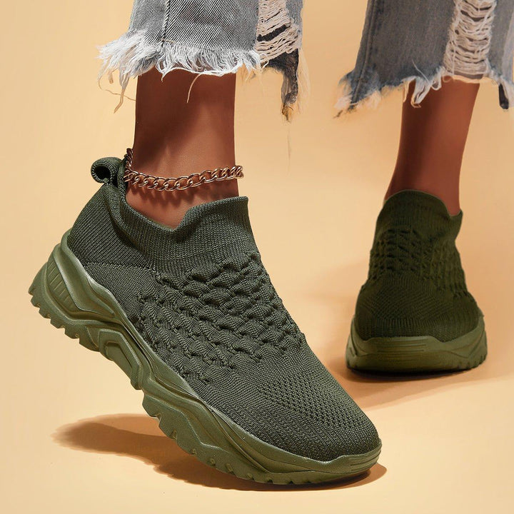 Olive green Ortho Cloud Slip-On Shoes, arranged neatly, ready for comfortable wear