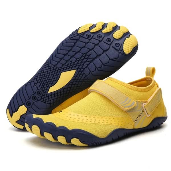 Pair of vibrant unisex quick-dry water shoes, ideal for active beach days & summer outdoor adventures.
