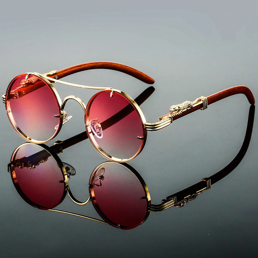 Sleek unisex retro double bridge sunglasses for men & women. Features UV protected gradient lenses in a round frame.