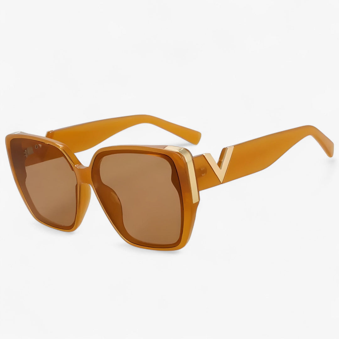 Mirrored V-shaped eyewear, angular design, ensuring futuristic style & UV400 protection.