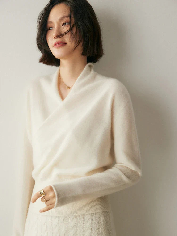Stylish women's pink cashmere crossover sweater, elegant knitwear design