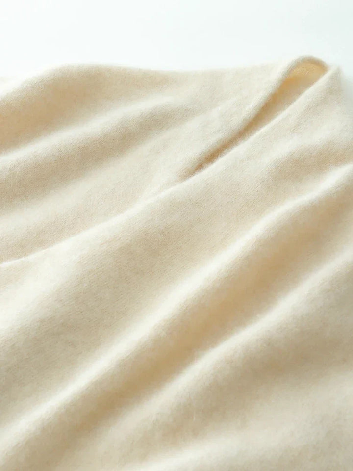 Detail of the knit pattern on a camel cashmere crossover sweater