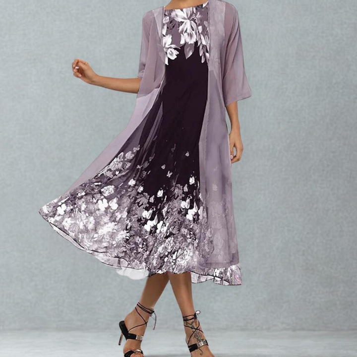 Women's A-line floral midi dress with 3/4 sleeves & round neck, perfect for elegant spring & summer casual wear.
