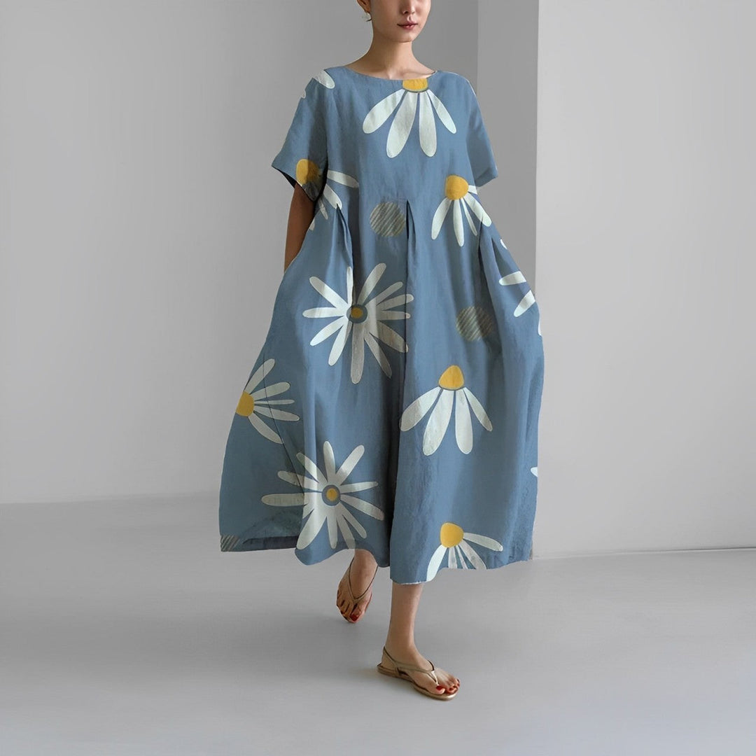 Chic women's midi dress with a modern artistic print, relaxed silhouette, short sleeves; perfect for summer fashion.