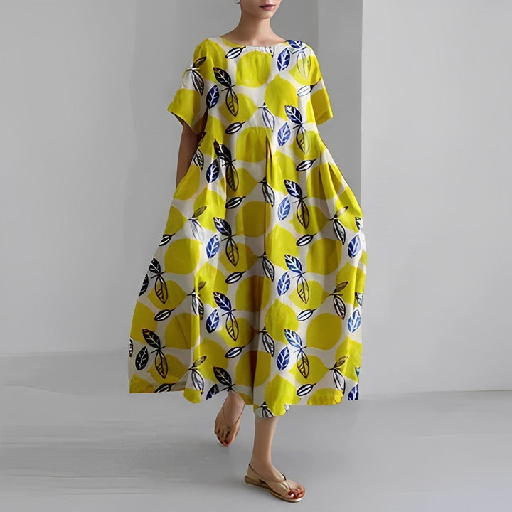 Versatile women's artistic print midi dress, relaxed fit, short sleeve, perfect for casual outings & summer days.