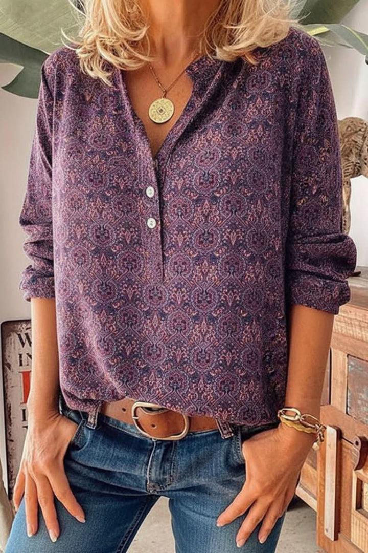 Stylish women's printed long sleeve blouse with artistic vintage design; a comfortable top for all-day wear.