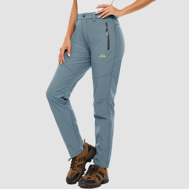 Close-up of the adjustable waist on women's grey softshell ski pants, winter wear