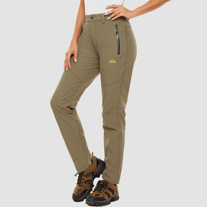 View of the reinforced knees on women's softshell ski pants, black, for durability
