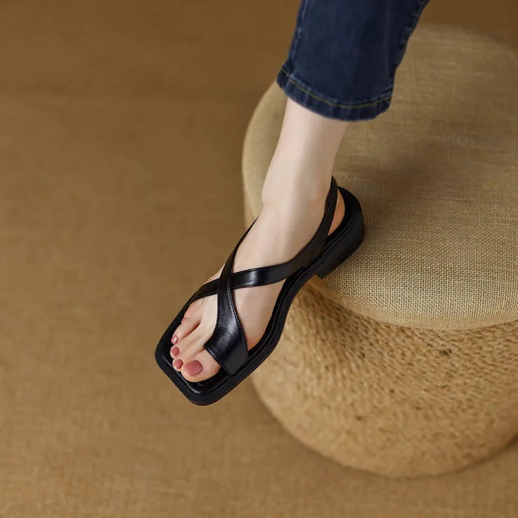 Stylish women's leather cross strap comfort sandals, perfect for versatile summer outfits