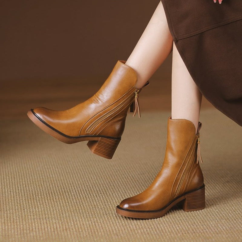 Women's versatile leather zip ankle boots, a must-have for winter fashion and comfortable footing