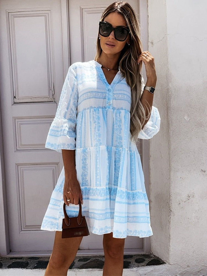 Lightweight flowy bohemian mini dress for women, with charming tiered flare sleeves, a casual pick.