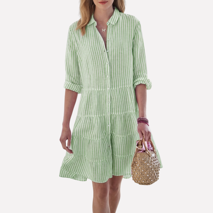 Comfortable women's breezy summer dress, ideal for vacation wear. Effortless sleeveless style.