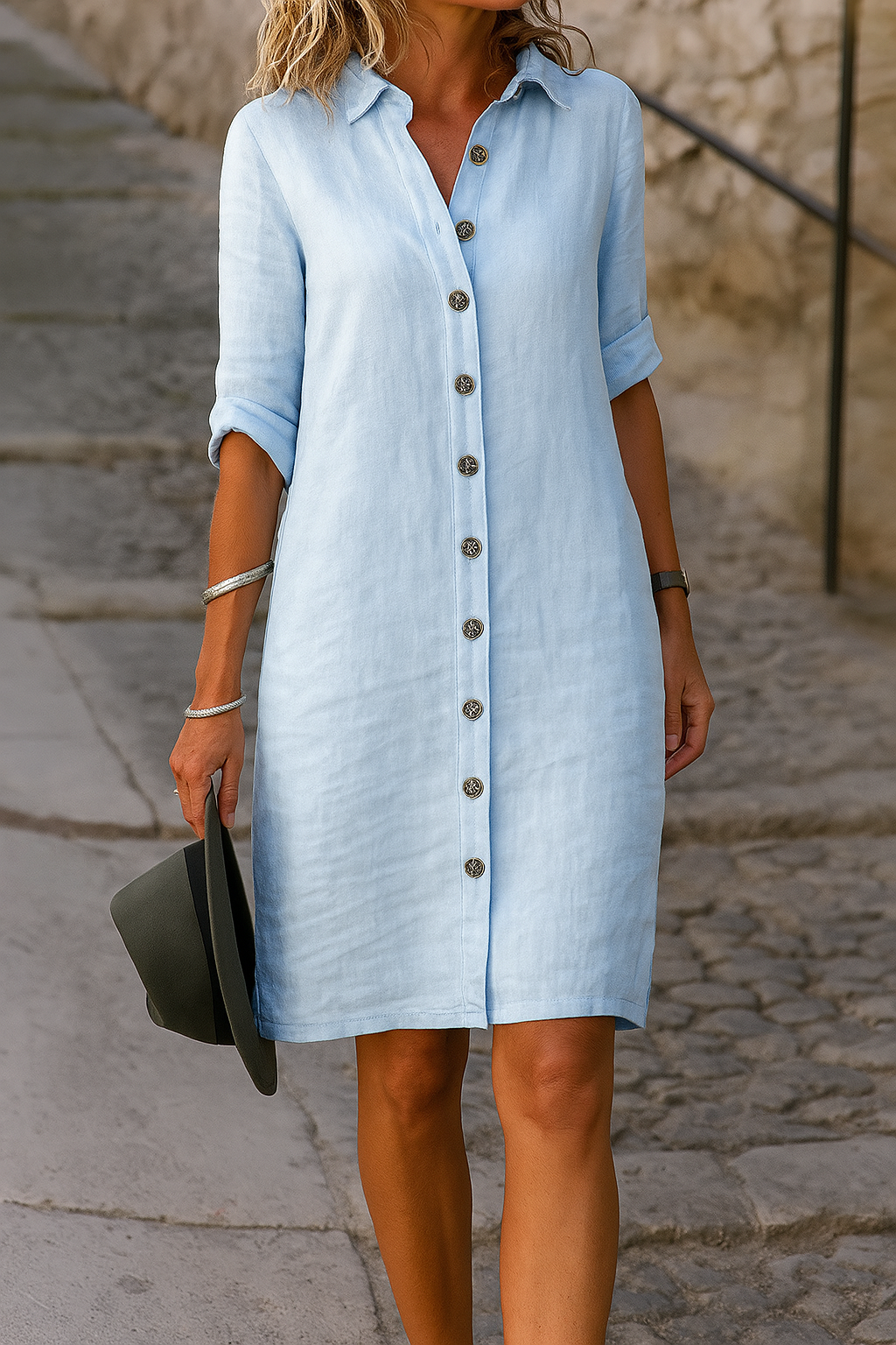 Knee-length women's shirt dress, button front, casual, with adjustable roll tab sleeves.