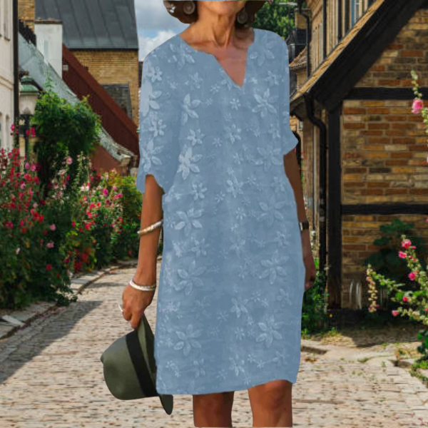 Short sleeve women's floral midi dress with V-neck, a beautiful and casual choice for any occasion.
