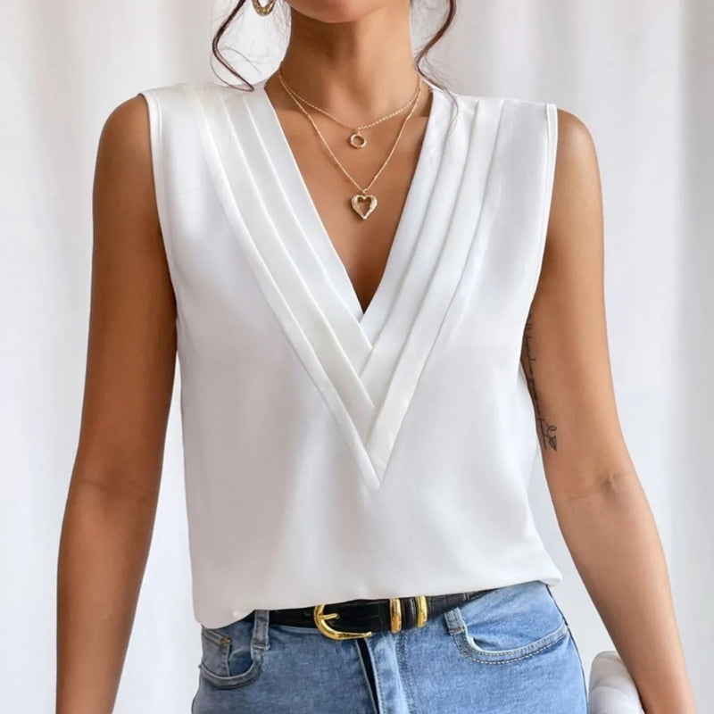 Dressy women's sleeveless V-neck blouse. Perfect lightweight top for versatile outfits