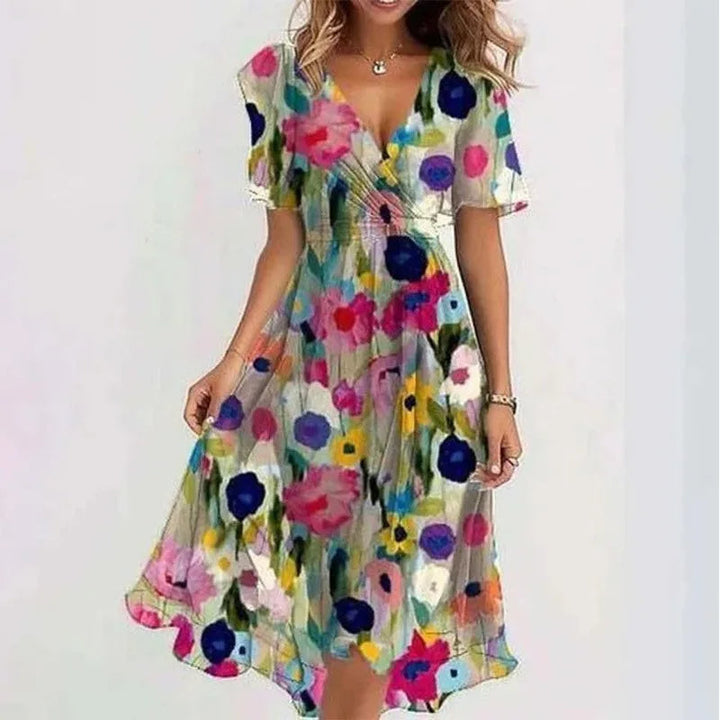 Vibrant women's floral A-line midi dress with V-neck, chic and comfortable for summer and vacation style.