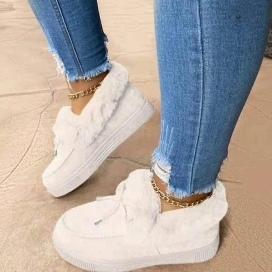 Round toe women's slip-on shoes, easy to wear, offering warm and casual comfort for winter.