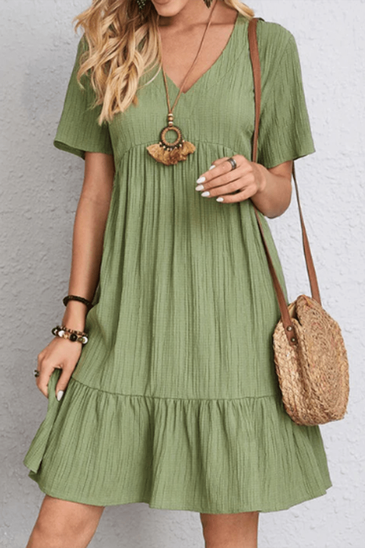 Women's summer midi dress, versatile for casual wear or elegant day-to-night looks.
