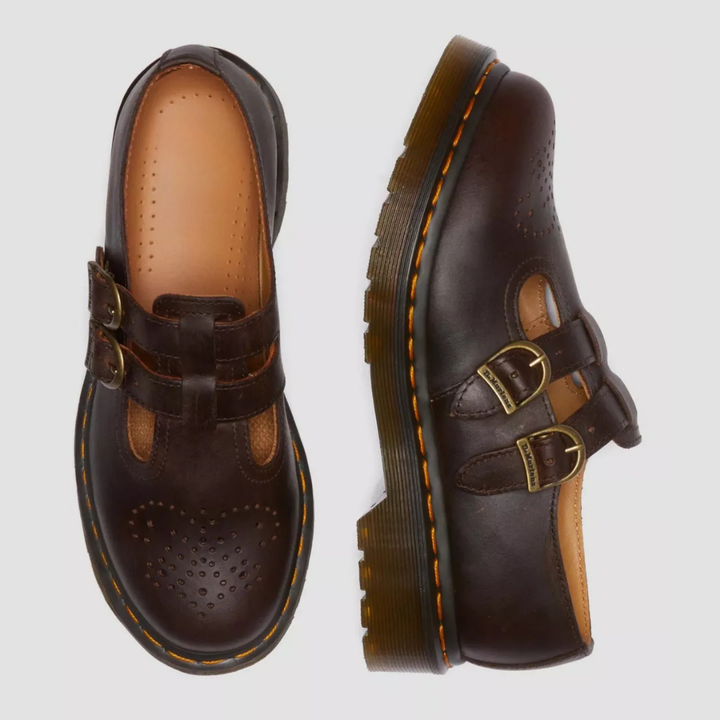 Black double buckle Mary Janes, edgy and comfortable women's fashion flats.