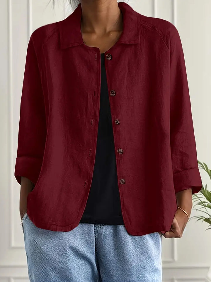 Womens clothing: effortless button-front casual top with 3/4 sleeves for versatile styling.