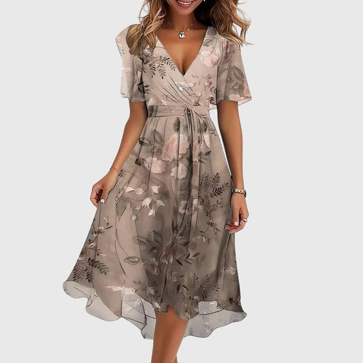 Chic summer midi dress for women, offering effortless style & comfort. Perfect for warm weather fashion.