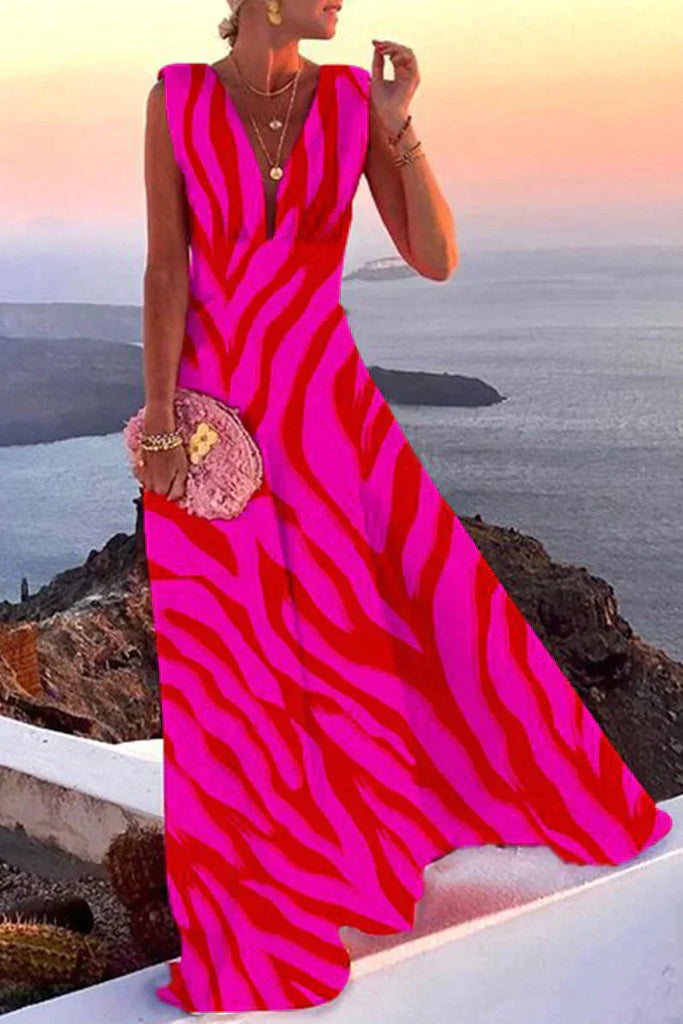 Flowy women's sundress, perfect for a beach vacation or casual summer outing. Elegant midi length.