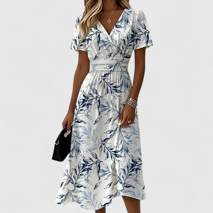 Versatile A-line botanical print midi dress for women, featuring a flattering V-neck, flutter sleeves & elasticated waist.