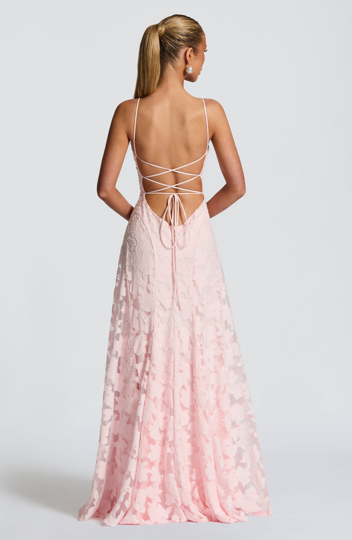 Women's vacation floral maxi dress, perfect for beach or resort, with waterfall neckline & lace-up back.
