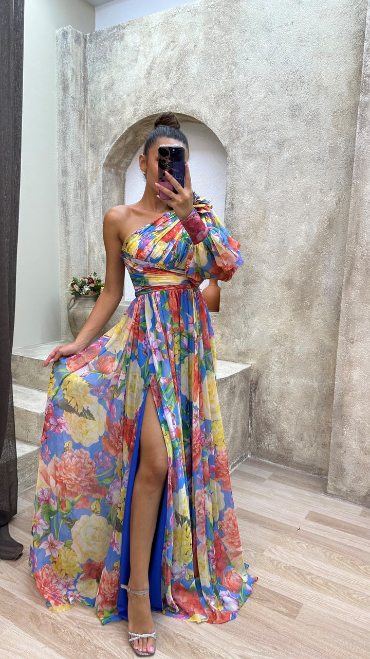 Beautiful one-shoulder floral maxi dress for women, featuring a flattering split hem and vibrant print.