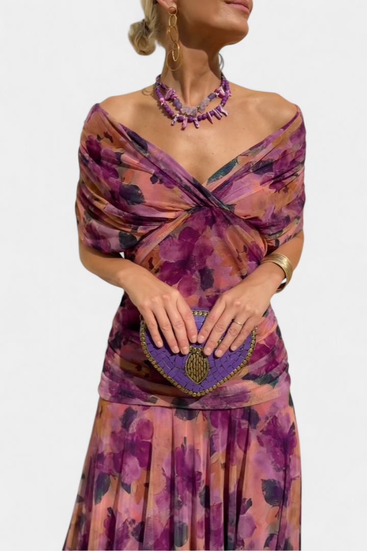 Chic floral long sleeve off-shoulder ceremony dress. Women's elegant maxi gown for weddings & special events.