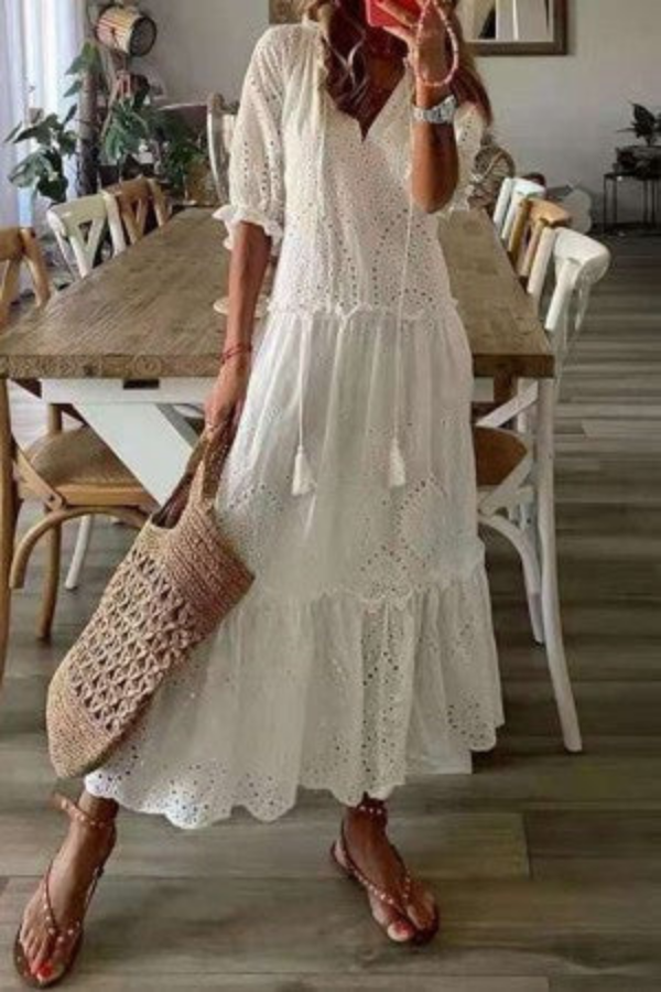 Flowy women's boho maxi dress, vibrant floral pattern, comfortable for summer vacations & beach outings.