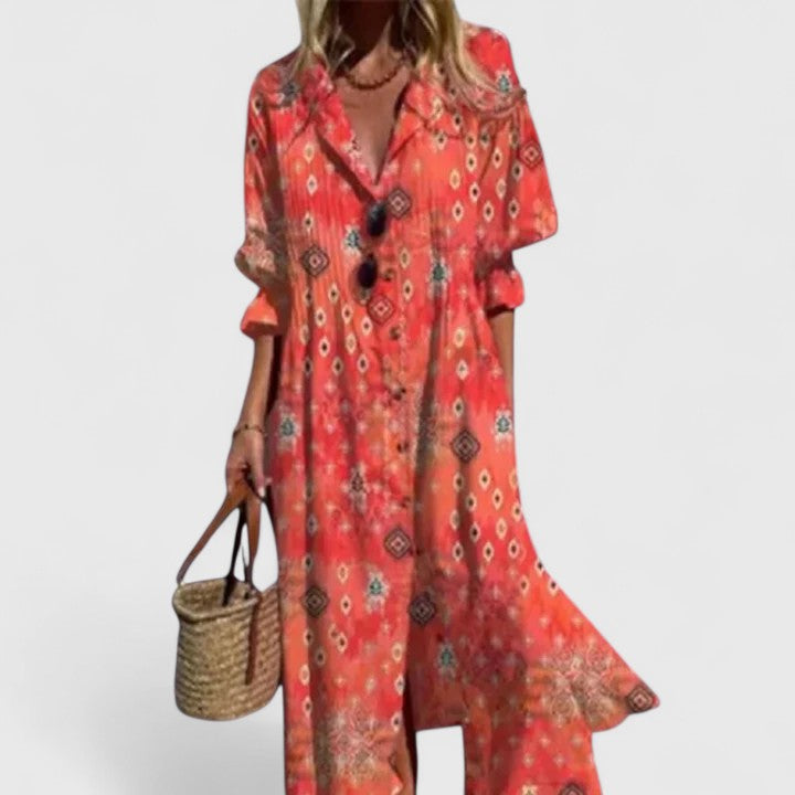 Comfortable women's floral midi shirtdress featuring pintuck pleats, a collar, and half sleeves. Perfect casual wear.