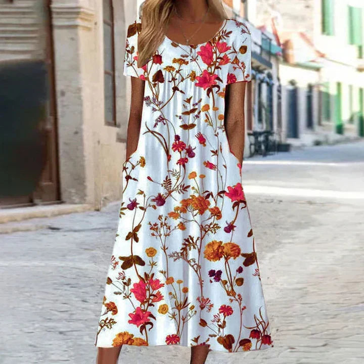 Beautiful women's floral print midi dress with short sleeves, versatile for casual day wear or elegant summer evenings.