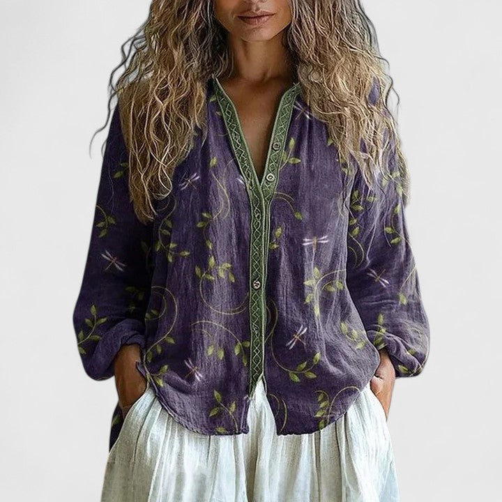 Women's floral zip-front long sleeve blouse with bohemian style print. Relaxed fit, perfect for casual wear.