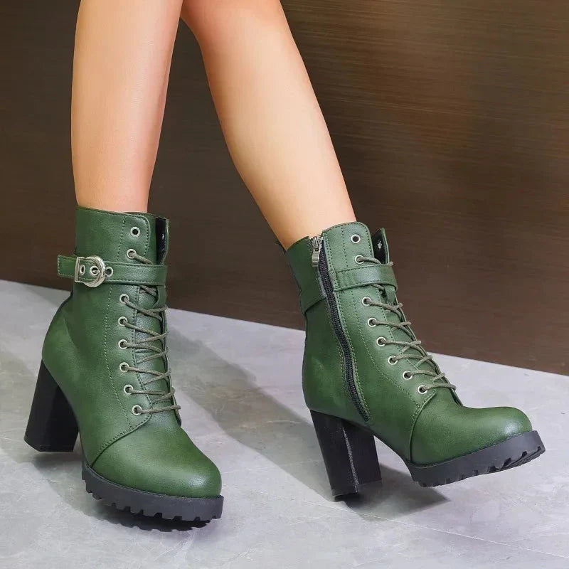 Women's heeled combat boots in black faux leather with lace-up front, perfect for fall fashion
