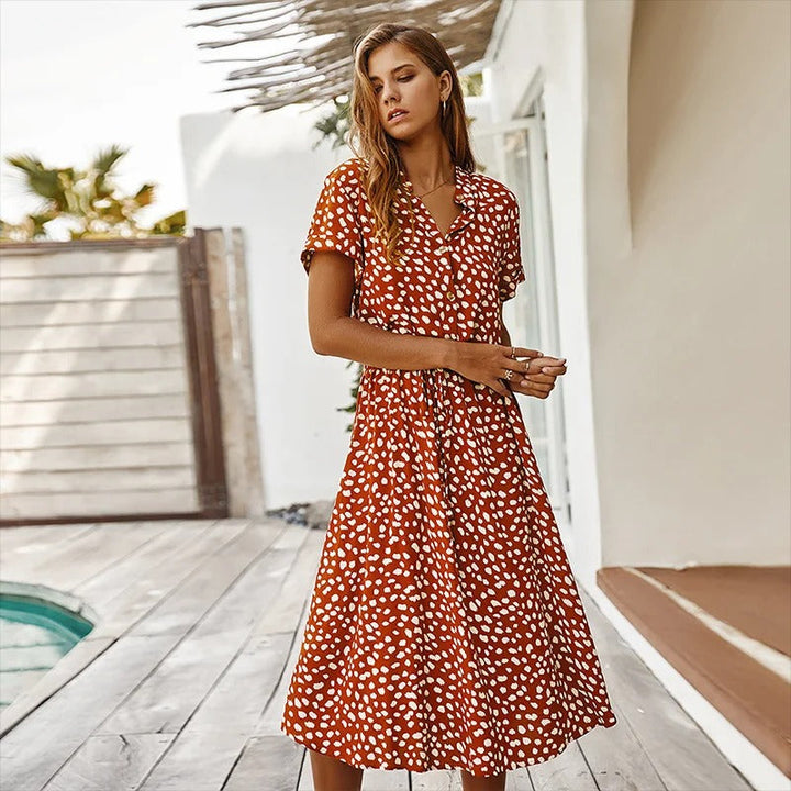 Leopard print button-down midi shirt dress for women, with a chic belt, great for vacation outfits.