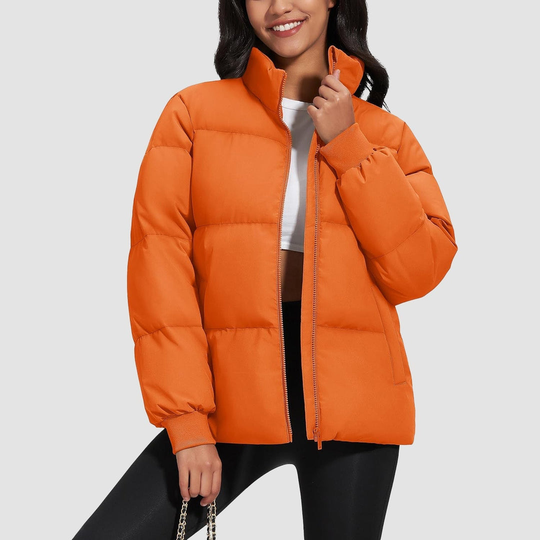 Back view of a black women's lightweight quilted puffer jacket, ideal for outerwear