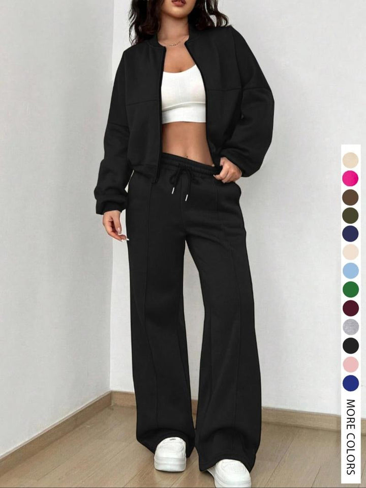 Model wearing the Women's Luxe Fleece Lounge Set, showcasing its relaxed fit and modern athleisure style