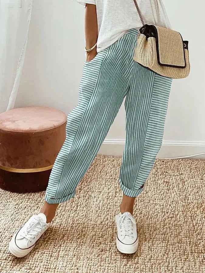 Comfortable women's relaxed fit striped pants with elastic waist for everyday casual wear.
