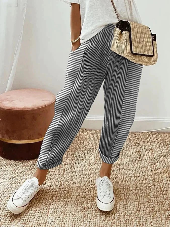 Versatile women's striped pants, offering a relaxed fit, elastic waist, and casual style.