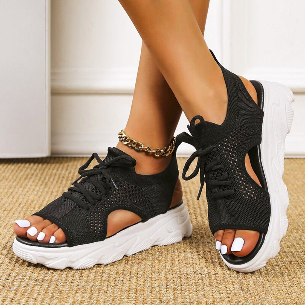 Stylish open-toe platform sandals for women. Lace-up design, great for travel & summer adventures.